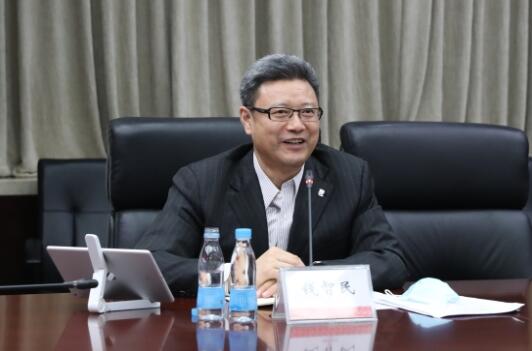 錢智民拜訪中國建材黨委書記、董事長周育先